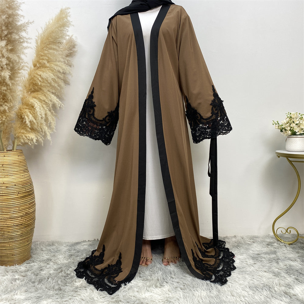 Brown abaya with black lace details on a white background