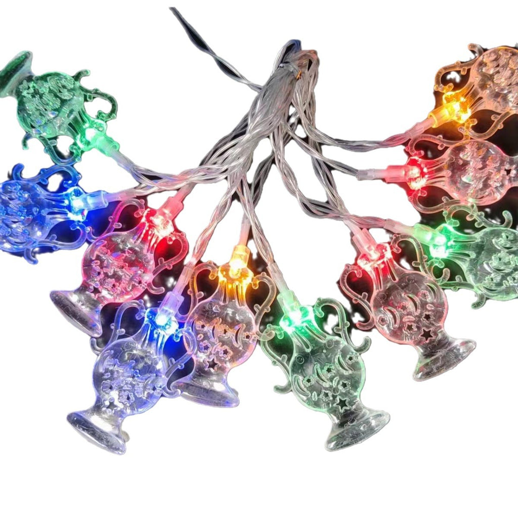 Decorative string lights with colorful, vintage-style lamps on a white background