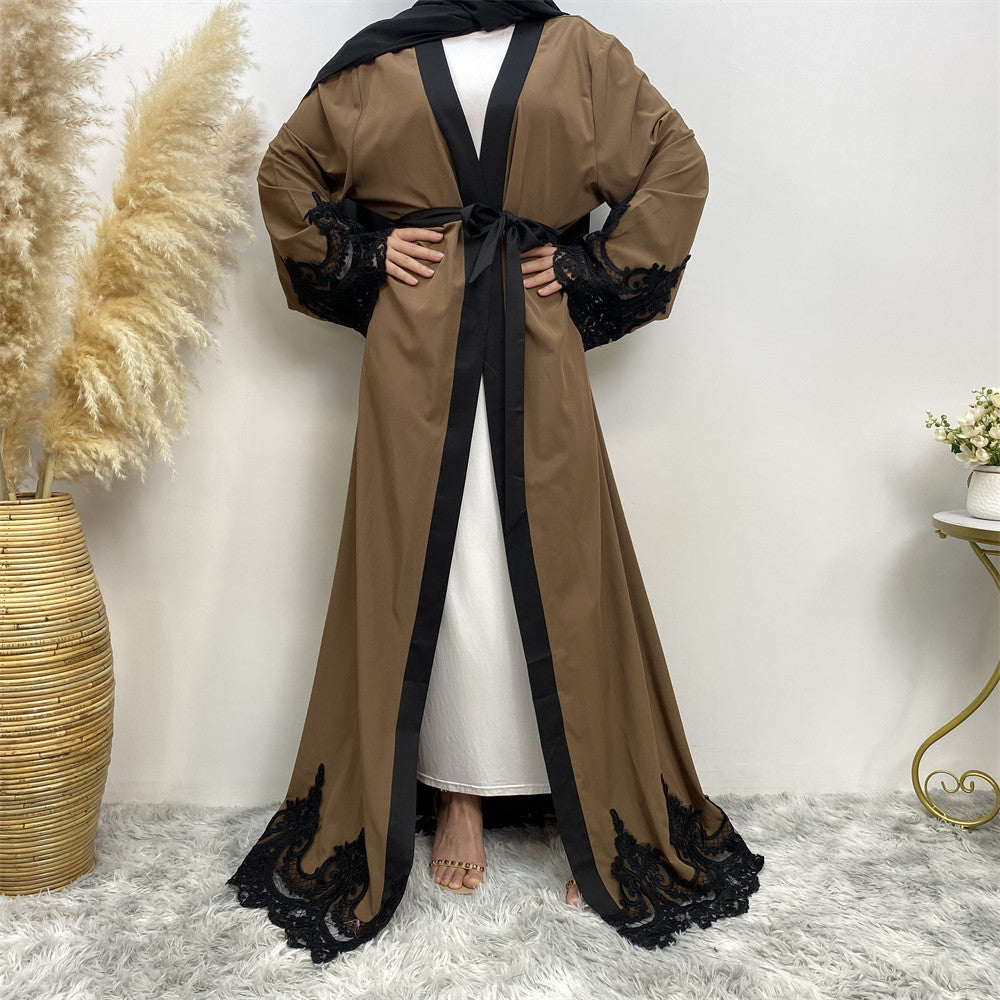 Brown robe with black lace trim on a white background